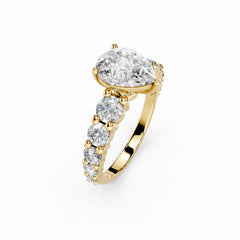 1.5 Carat Pear Cut Diamond Engagement Ring with Round Side Diamonds